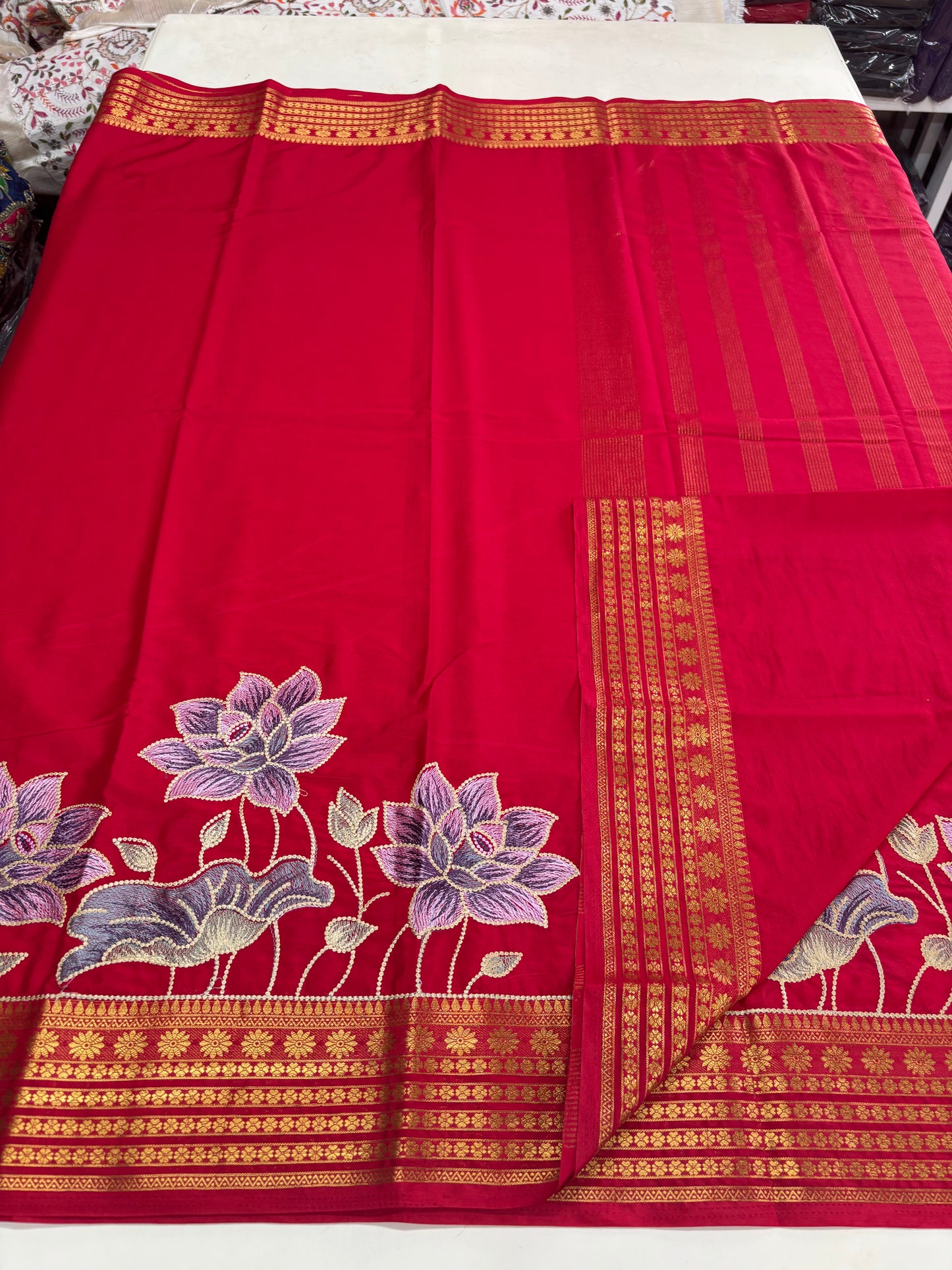 Semi Mysore Crepe(Premium, Small Lotus Bentex Border And Rich Floral Embroidery)