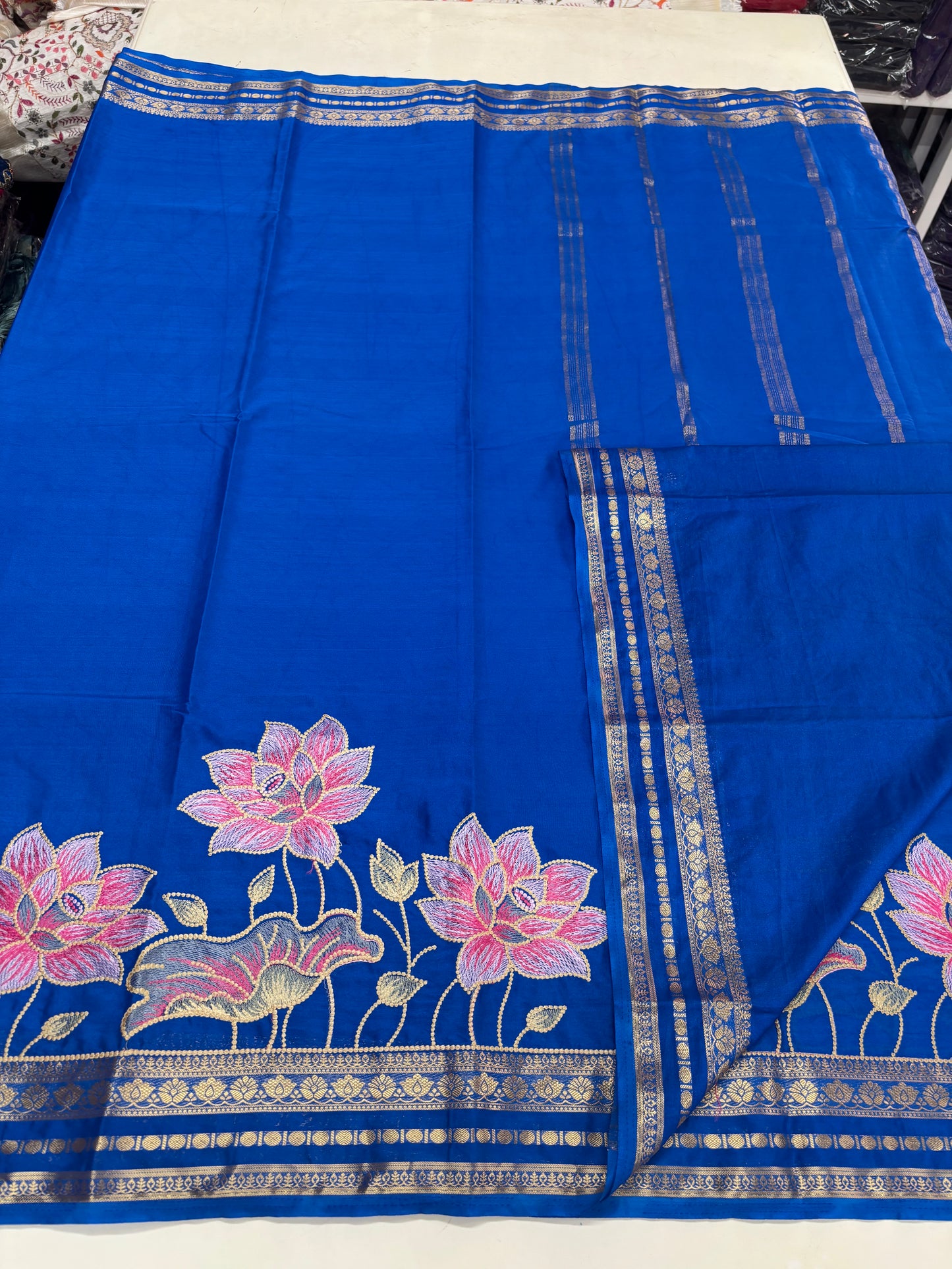Semi Mysore Crepe(Premium, Small Lotus Bentex Border And Rich Floral Embroidery)