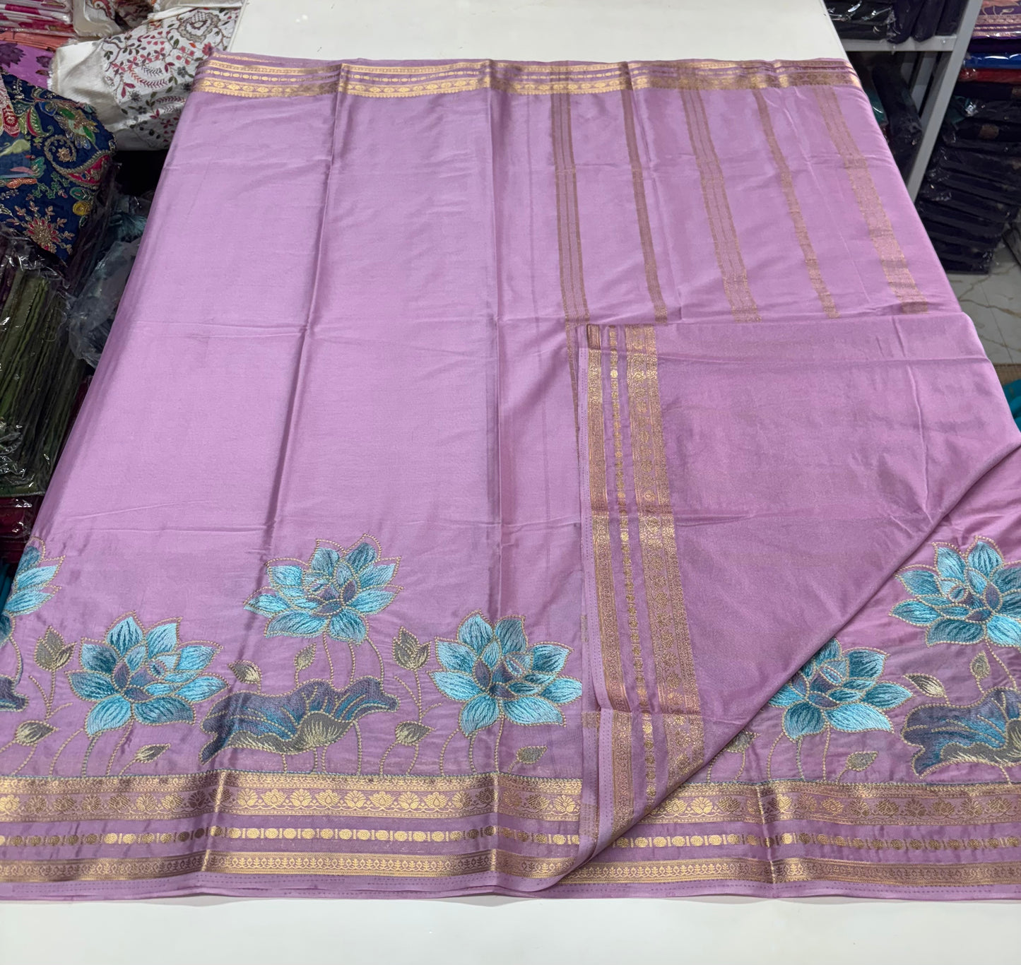 Semi Mysore Crepe(Premium, Small Lotus Bentex Border And Rich Floral Embroidery)