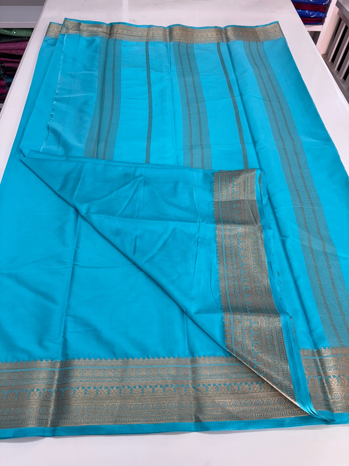 Semi Mysore Crepe (Self Medium Floral Border)